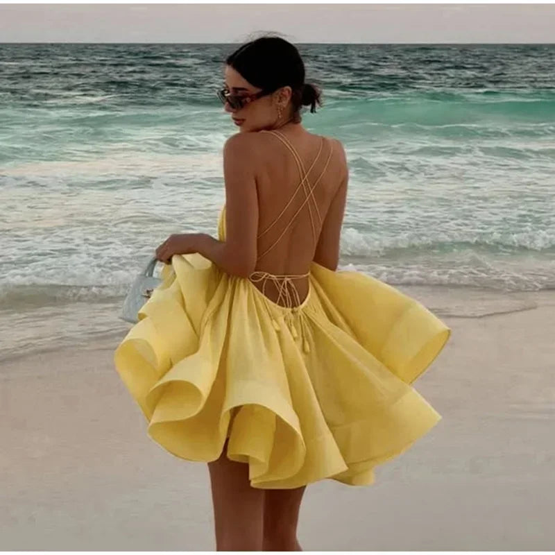 Robe de plage courte bouffante dos nu pour femme, tenue sexy à lacets, sans manches, coupe trapèze, couleur unie, idéale pour les vacances en bord de mer, été 2025
